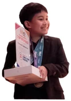 Smiling IMC student holding his Top Winner trophy and medals